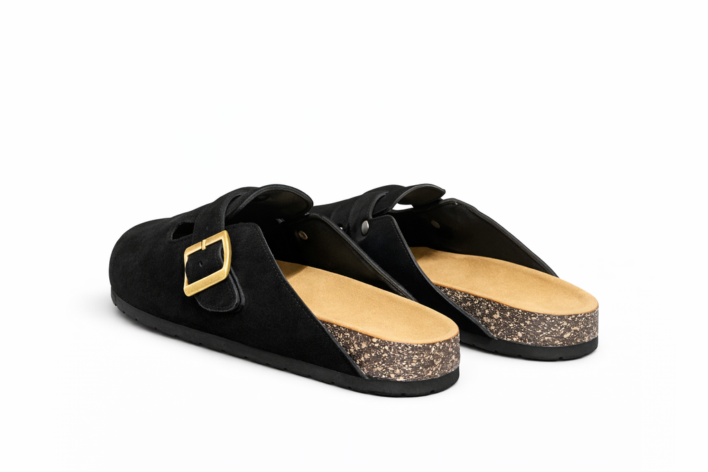 Black sandals with cork sole on a white background